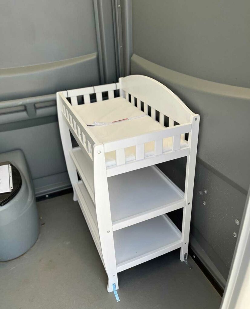portable restroom with changing table